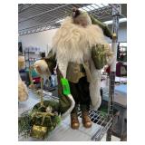 Green and Gold Santa Claus Figure