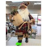 Plaid-Clad Santa Figurine with Accessories