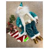Santa Figurine with Stocking and Decorations
