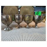 Four Silver Toned Metal Goblets