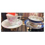 Two Decorative China Teacup and Saucer Sets
