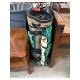 Two Golf Bags with Clubs Including Knight and Tayl