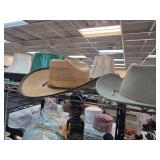Two Cowboy Hats With Distinct Features