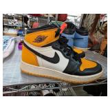 Air Jordan Retro High OG Shoes in Black and Yellow