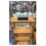 Wooden Shelf Unit With Metal Scrollwork Top