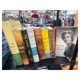 Eight Hardcover Books