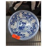 Blue and White Ceramic Bowl with Floral Motif