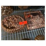 Two Copper Mold Decorations
