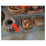 Three Decorative Metal Molds