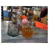 Four Decorative Glass Perfume Bottles