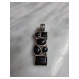 Sterling Silver Pendant With Black Stone Accents