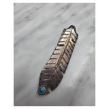 Metal Feather Pendant with Blue Stone Accent