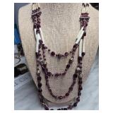 Multi-Strand Beaded Necklace With Red and White Ac