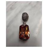 Sterling Silver Pendant with Amber-Toned Stone