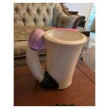 Handcrafted Ceramic Mug with Unique Handle Design