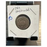 1869 Shield Nickel in Protective Holder