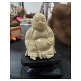Carved Ivory Buddha Figure on Wooden Base