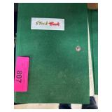 Green Stock Book with Assorted Stamps