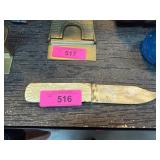 Carved Bone Knife With Decorative Handle