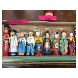 Hand-Painted Wooden Figurine Set on Display Base