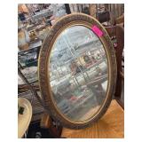 Oval Mirror With Ornate Gold-Toned Frame