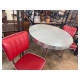 Retro Chrome Table with Four Red Vinyl Chairs