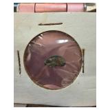 Ancient Fragmented Coin in Display