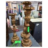 Three Decorative Gold-Tone Candlesticks