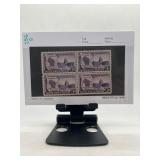Block of 4 US 3-Cent Stamps on Display
