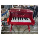 Red Schylling Toy Piano With Black Keys