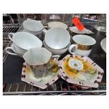 Teacups and Saucers with Gold Accents