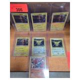 Six Pokemon Cards Including Holos and Detective Pi