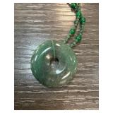 Jade Donut Pendant on Knotted Cord Necklace