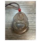 Nephrite Pendant Depicting a Laughing Buddha