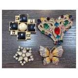 Set of Four Decorative Brooches