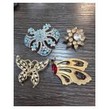 Four Decorative Brooches
