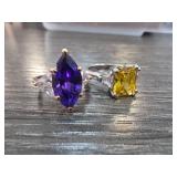 Two Gemstone Rings Featuring Purple and Yellow Sto