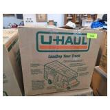 Clothes in U-Haul Box