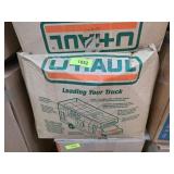 Clothes in U-Haul Box