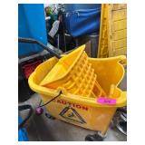 Yellow Mop Bucket with Wringer on Wheels