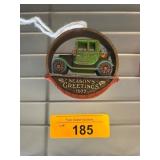 1977 Seasonï¿½s Greetings Ornament Featuring Car