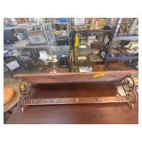 Wall-Mounted Wooden Shelf With Brass Accents