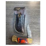 Damascus Steel Folding Knife with Leather Sheath