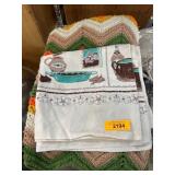 Crocheted Blanket and Printed Tea Towels