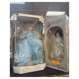 Two Boxed Collectible Porcelain Dolls