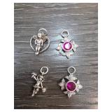 Four Sterling Silver Charms