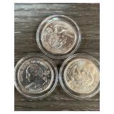 Three State Quarter Coins with Cases