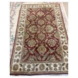 Handmade Wool Area Rug in Red and Ivory