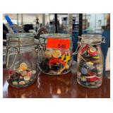 Three Jars Filled With Assorted Buttons and Tokens