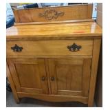 Wooden Sideboard With Ornate Back Panel